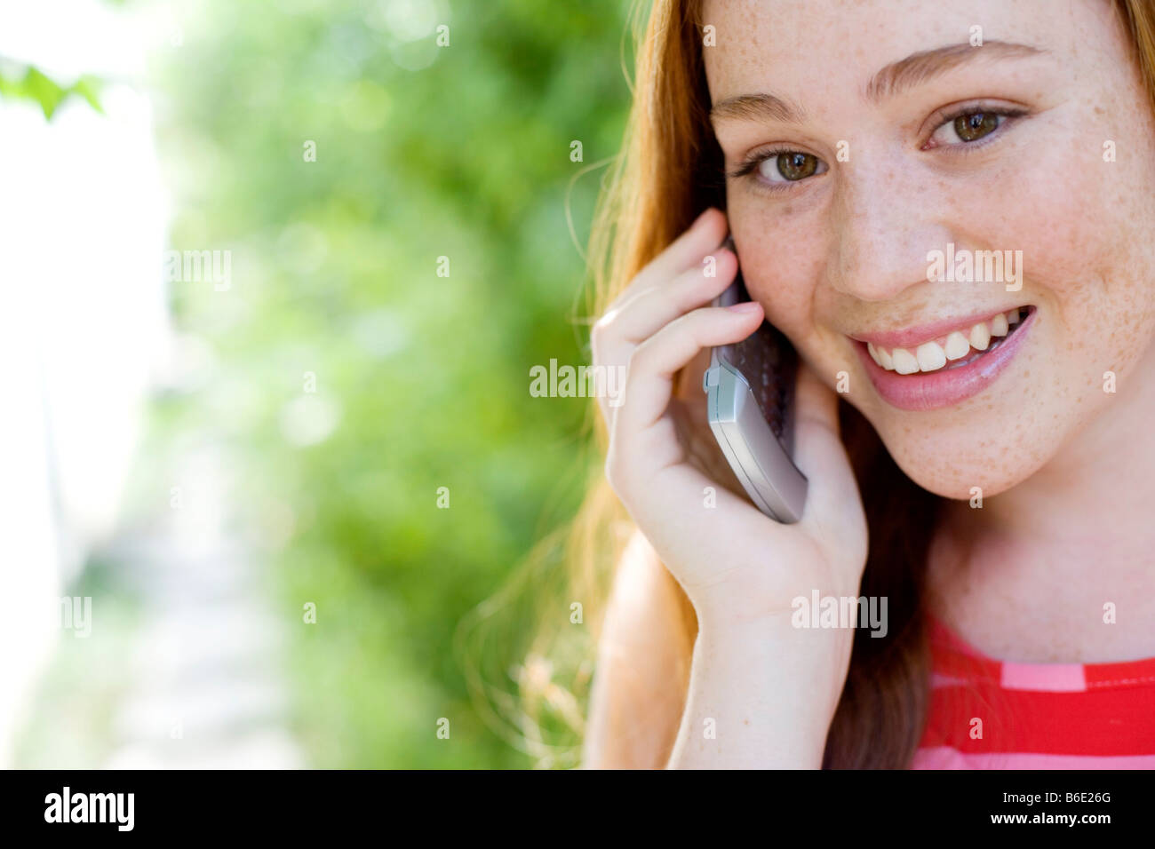 Girl using a mobile telephone Stock Photo Alamy