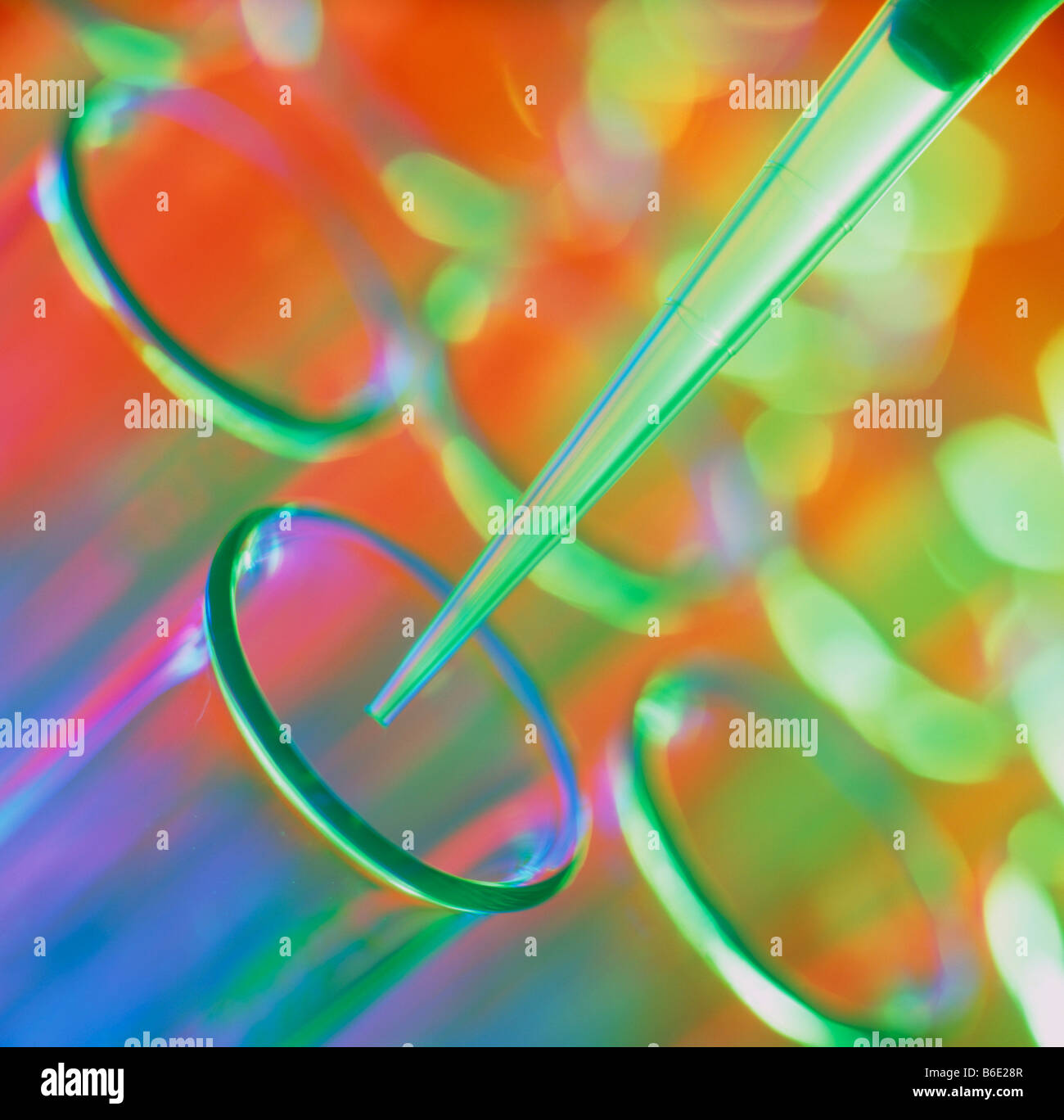 Laboratory glassware. A pipettor tip above the rim of a test tube Stock ...