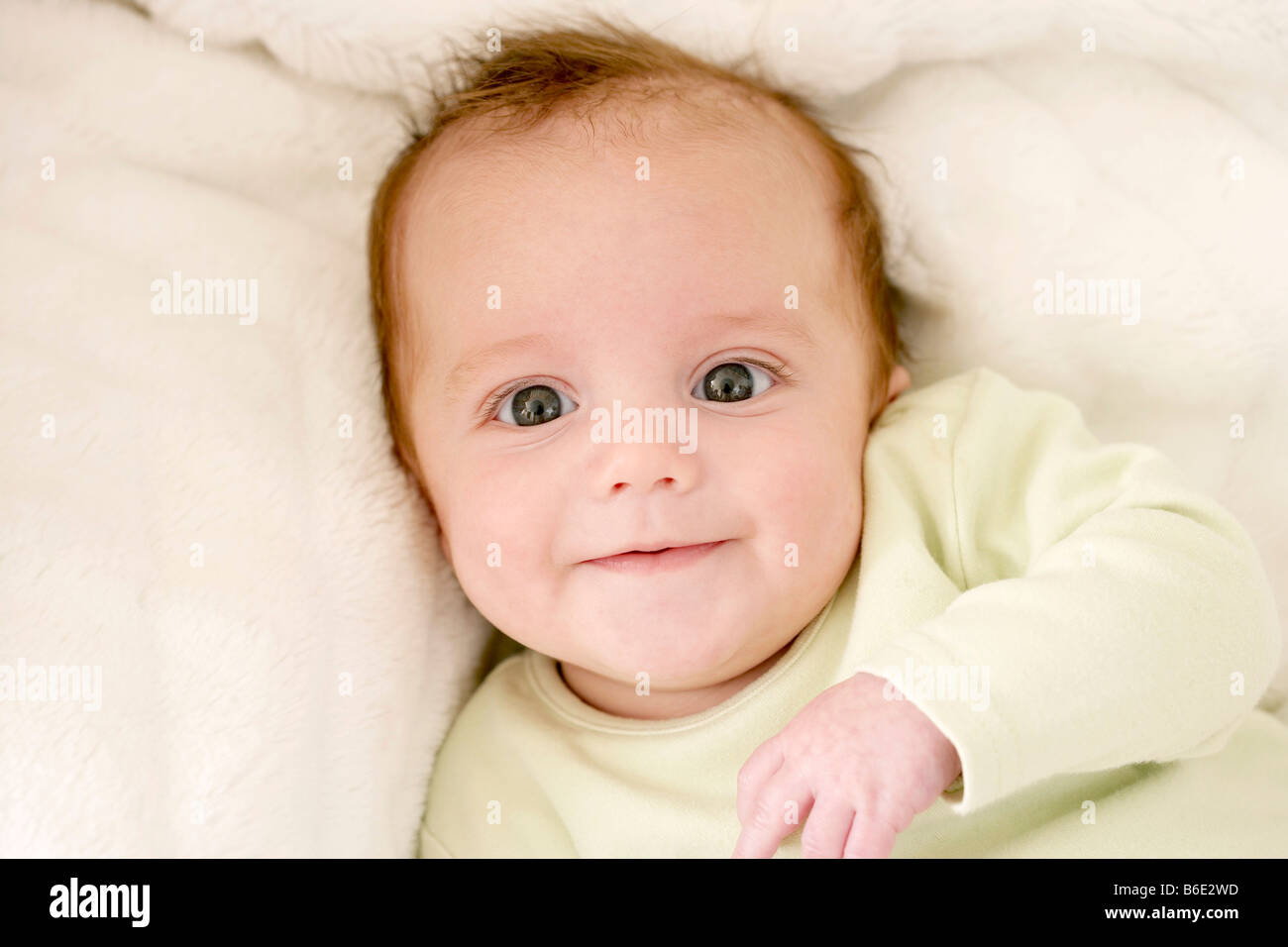 Cot smiling relaxation bed infant hi-res stock photography and images ...