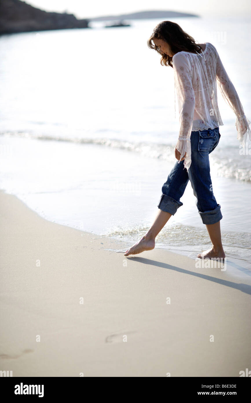 Barefoot woman jeans outside hi-res stock photography and images - Alamy