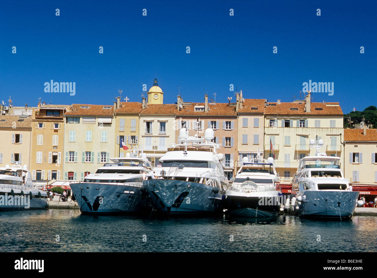 Yacht and luxury boat moored in the Saint Tropez harbour Stock Photo