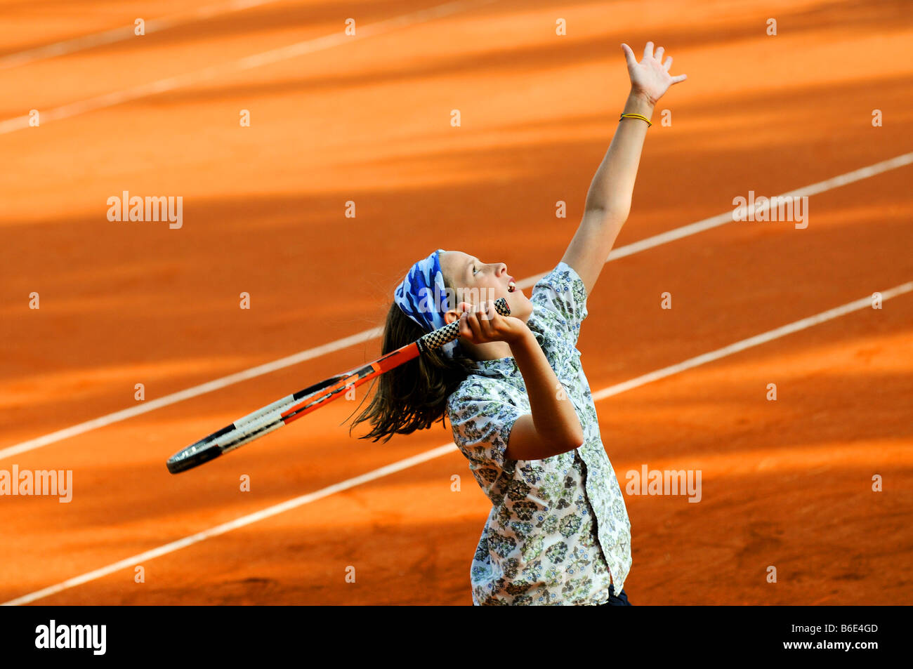 close up action shot of girl playing tennis Stock Photo