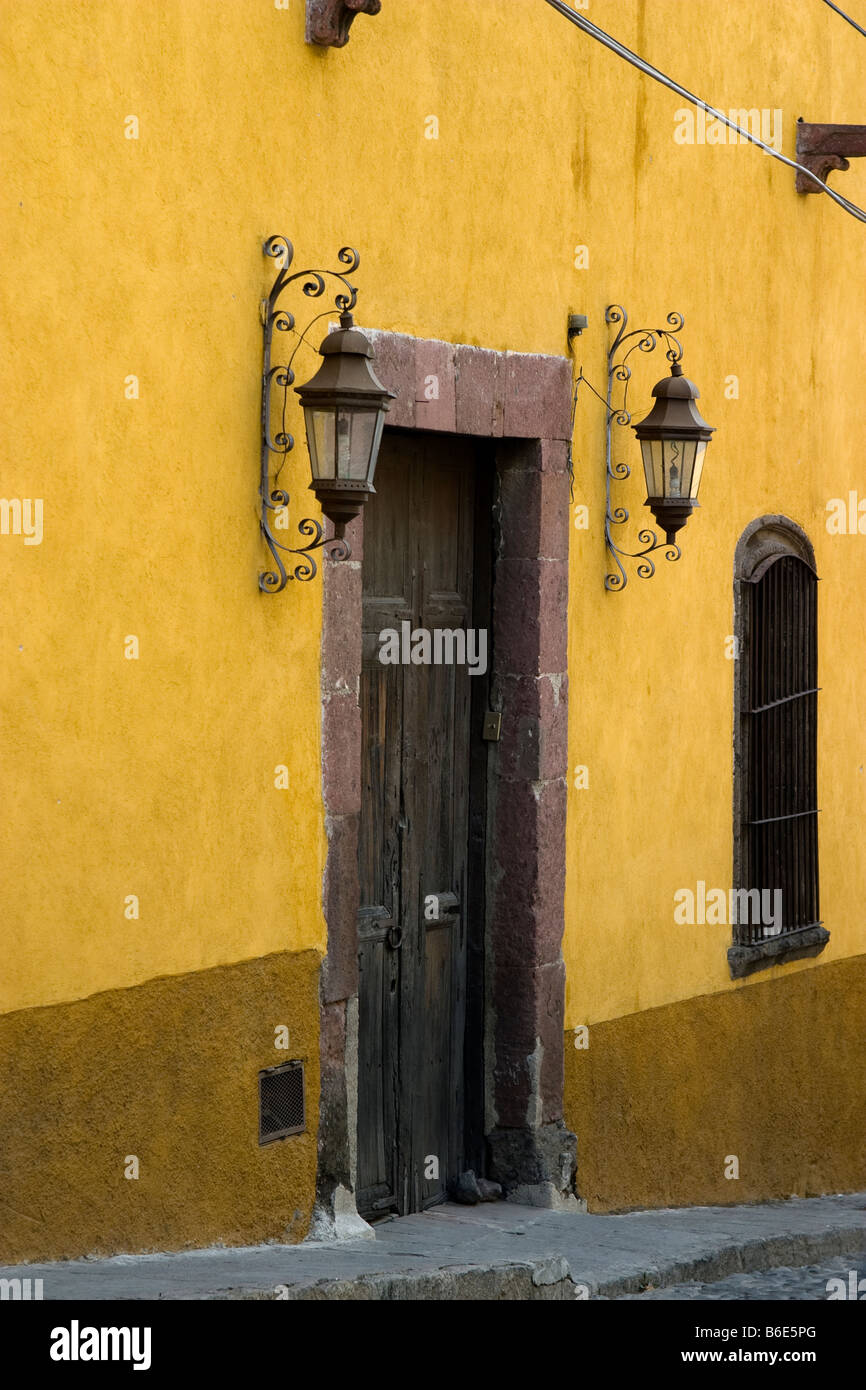 Brightly colored building on street in San Miguel de Allende Mexico Stock Photo