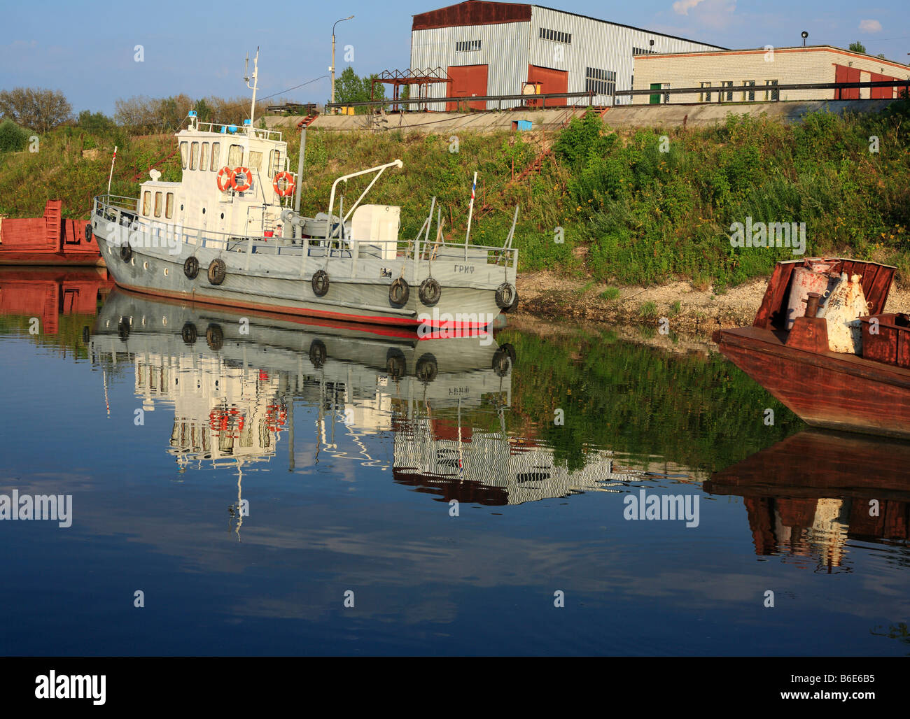 Old ship, vessel, boat on Oka river, reflection, summer, Ryazan region, Russia Stock Photo