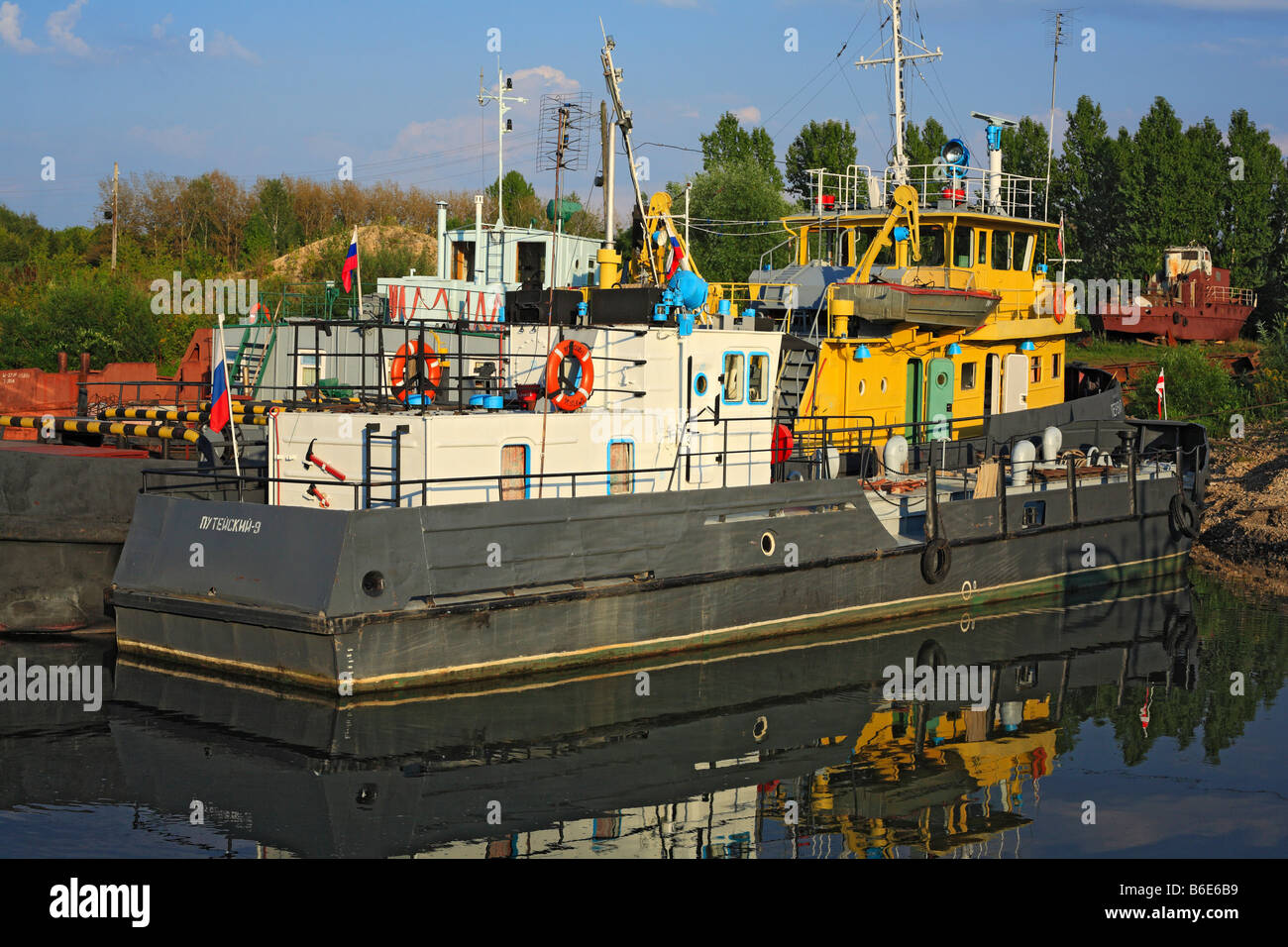 Old ship, vessel, boat on Oka river, reflection, summer, Ryazan region, Russia Stock Photo