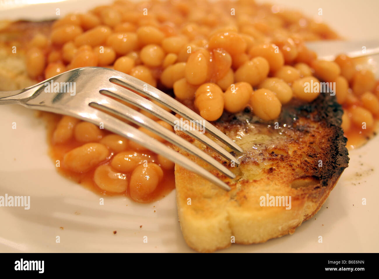 Baked beans on toast, a popular British dish Stock Photo Alamy