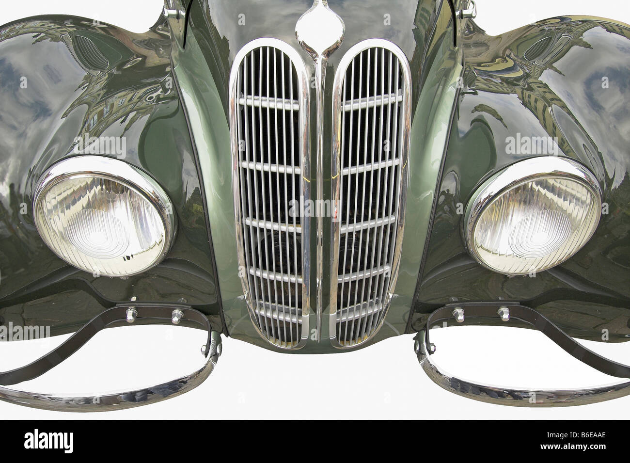 The front of antiquarian car isolated over white with clipping path