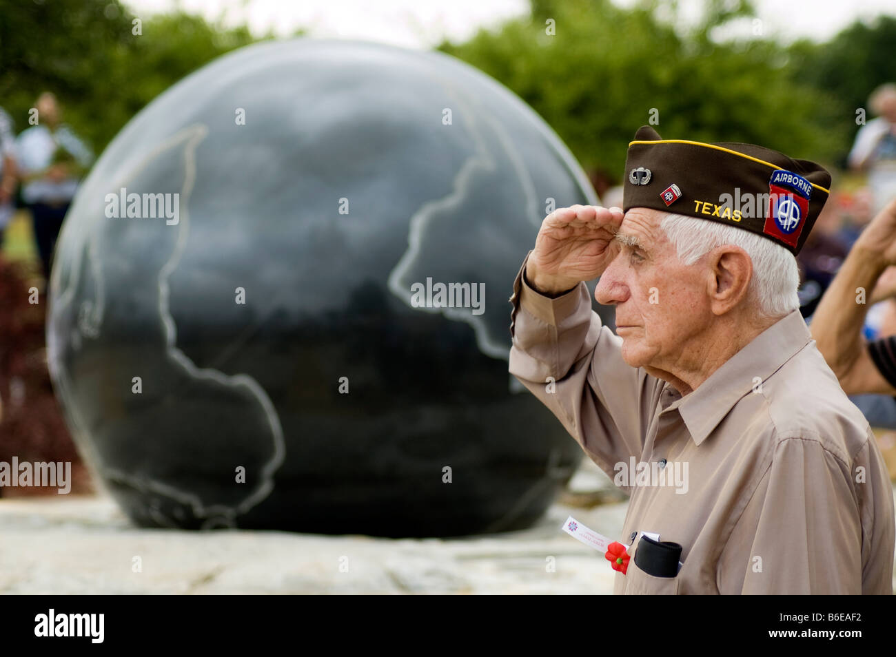 Texan World War II veteran salutes the US flag at a Memorial Day ceremony in Frisco, north Texas. Stock Photo