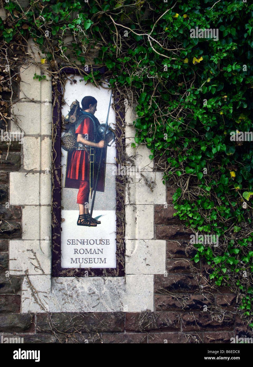 Roman soldier depicted on the outside wall of Senhouse Roman Museum, Maryport, Cumbria Stock Photo