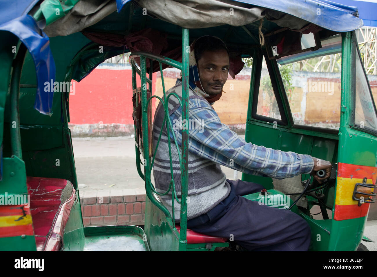 An auto rickshaw driver Dhaka Stock Photo