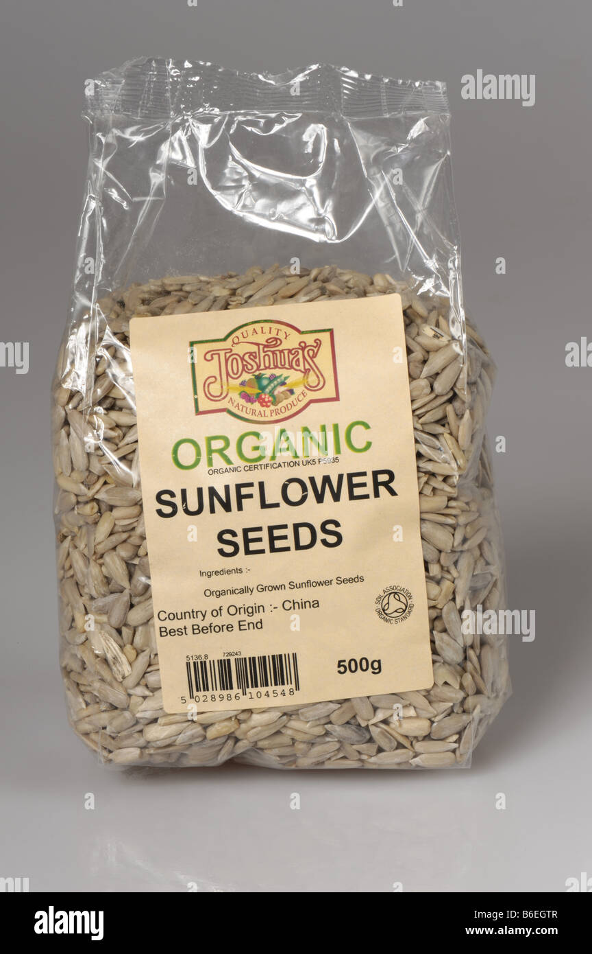 Organic sunflower seeds as sold in health food shops grown in China Stock Photo
