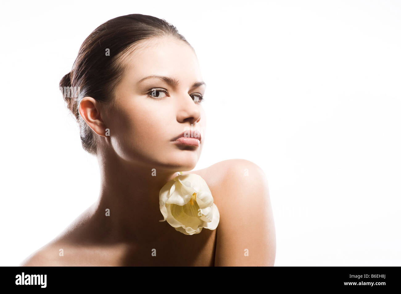 young woman with white tulip Stock Photo