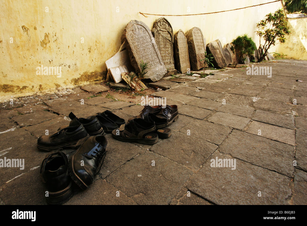 Hebrew inscribed gravestones outside of the Paradesi Synagogue in Jewtown, Kerala, India. Stock Photo