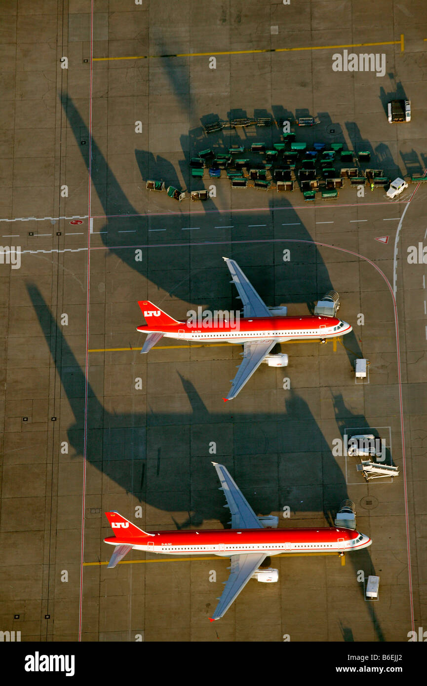 Aerial view of Duesseldorf Airport, Rhein-Ruhr-Flughafen, LTU holiday planes being prepared for flight on the apron, North Rhin Stock Photo