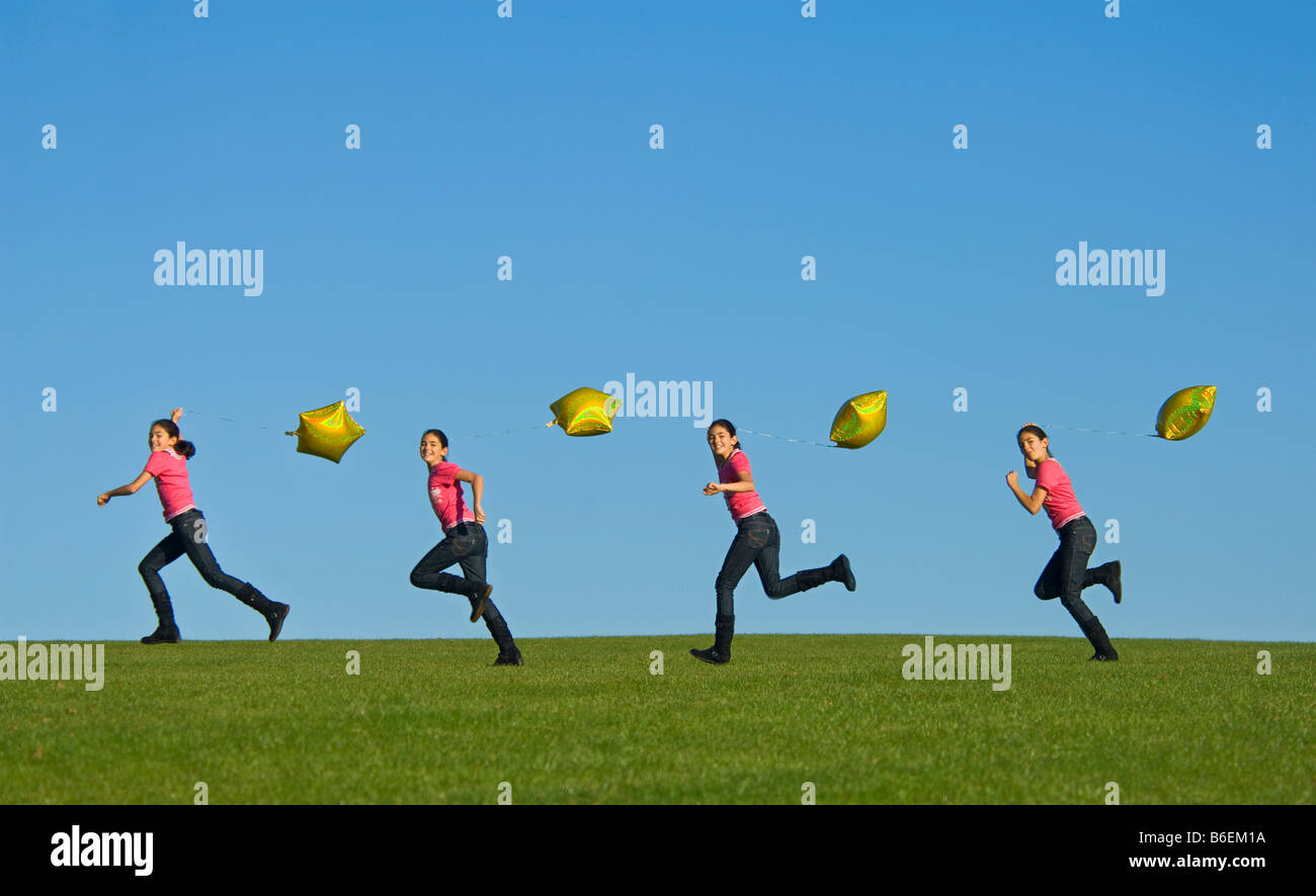 A sequence image of a young girl (11) running happily across green