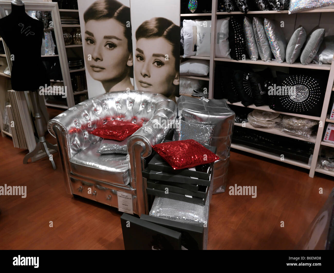 Cite Europe Coquelles France Soft Furnishing Shop Silver Chair and Audrey Hepburn Picture Stock Photo