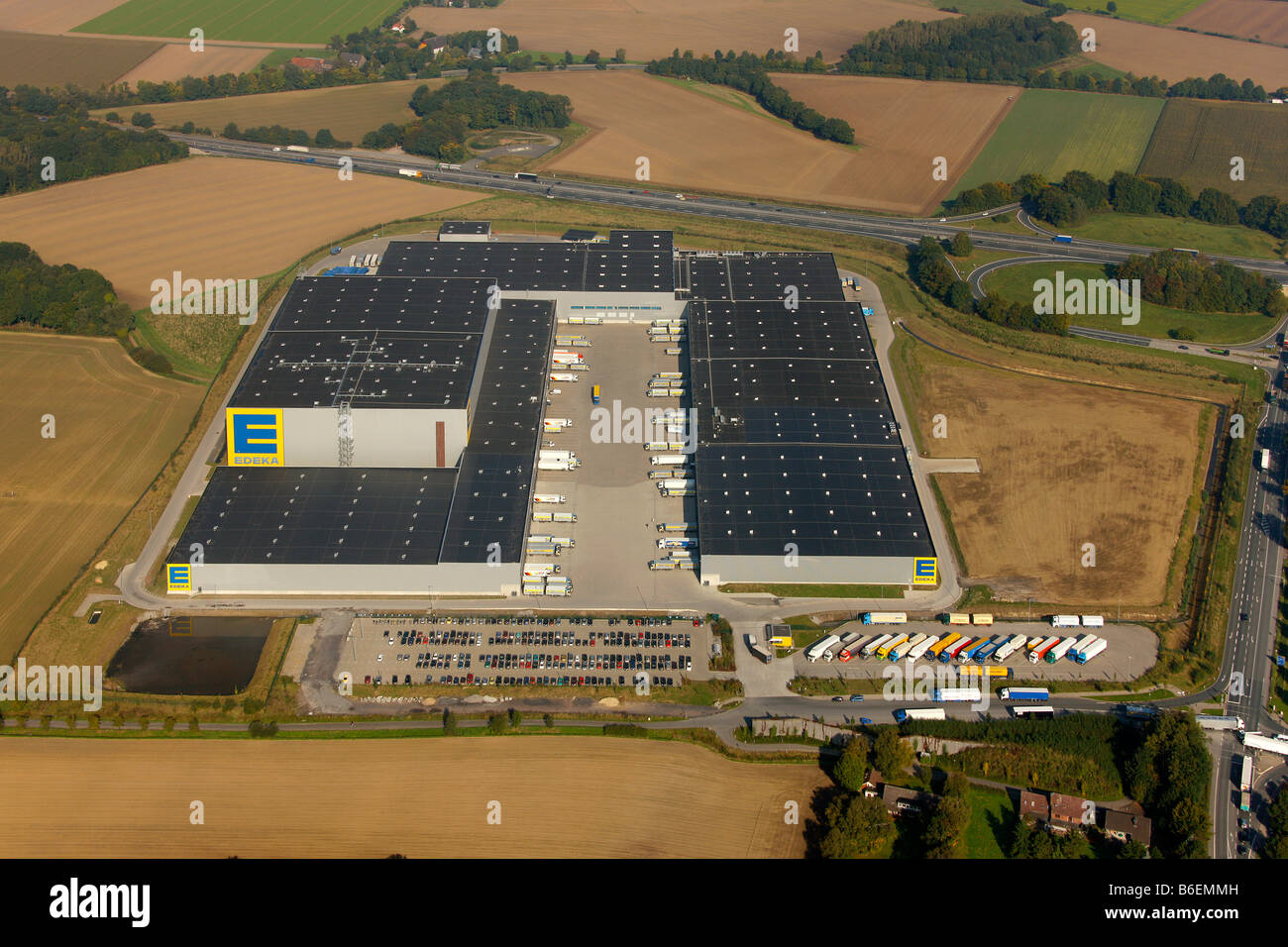 Aerial photograph, EDEKA, EDEKA-Logistik, wholesaler, foodstuffs concern, warehouse, motorway A2, B63, Rhynern, Hamm, Ruhr Area Stock Photo