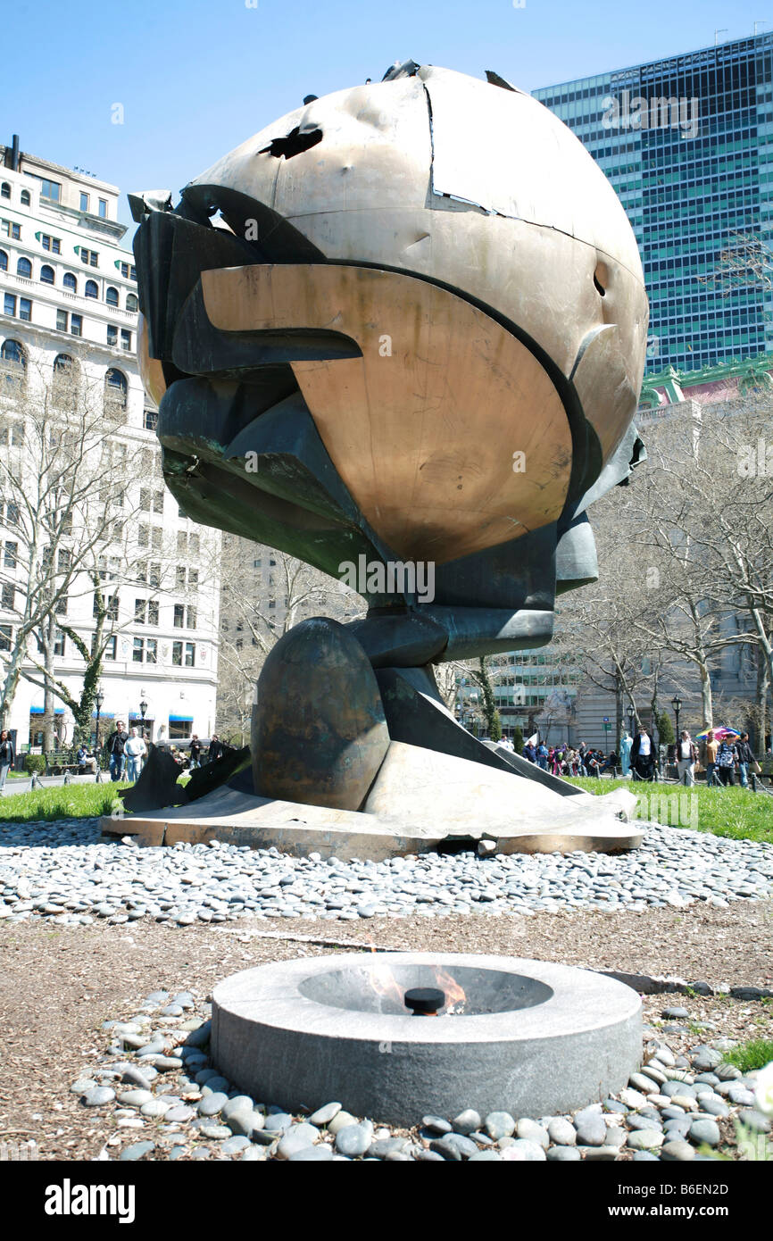 Golden ball, The Sphere, by the German sculptor Fritz Koenig at the World Trade Center site in New York, withstood the collapse Stock Photo