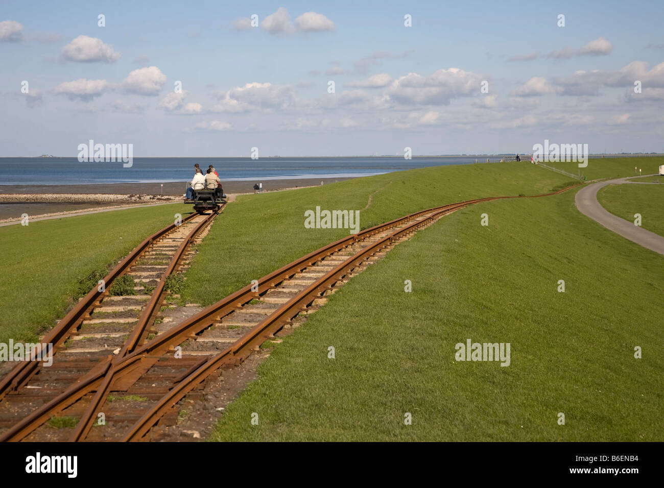 Tourists transported on a narrowgauge train track called Lorengleis on