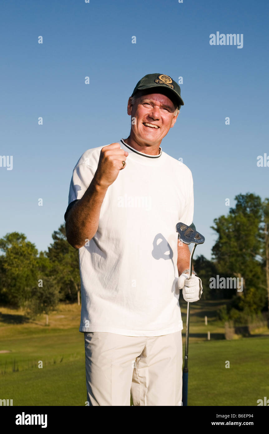 Man succeed with golf Stock Photo