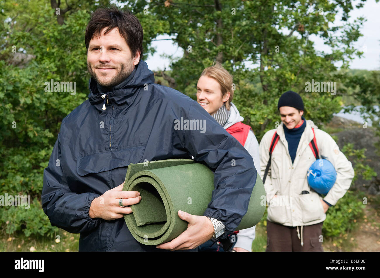 Three guys camping Stock Photo