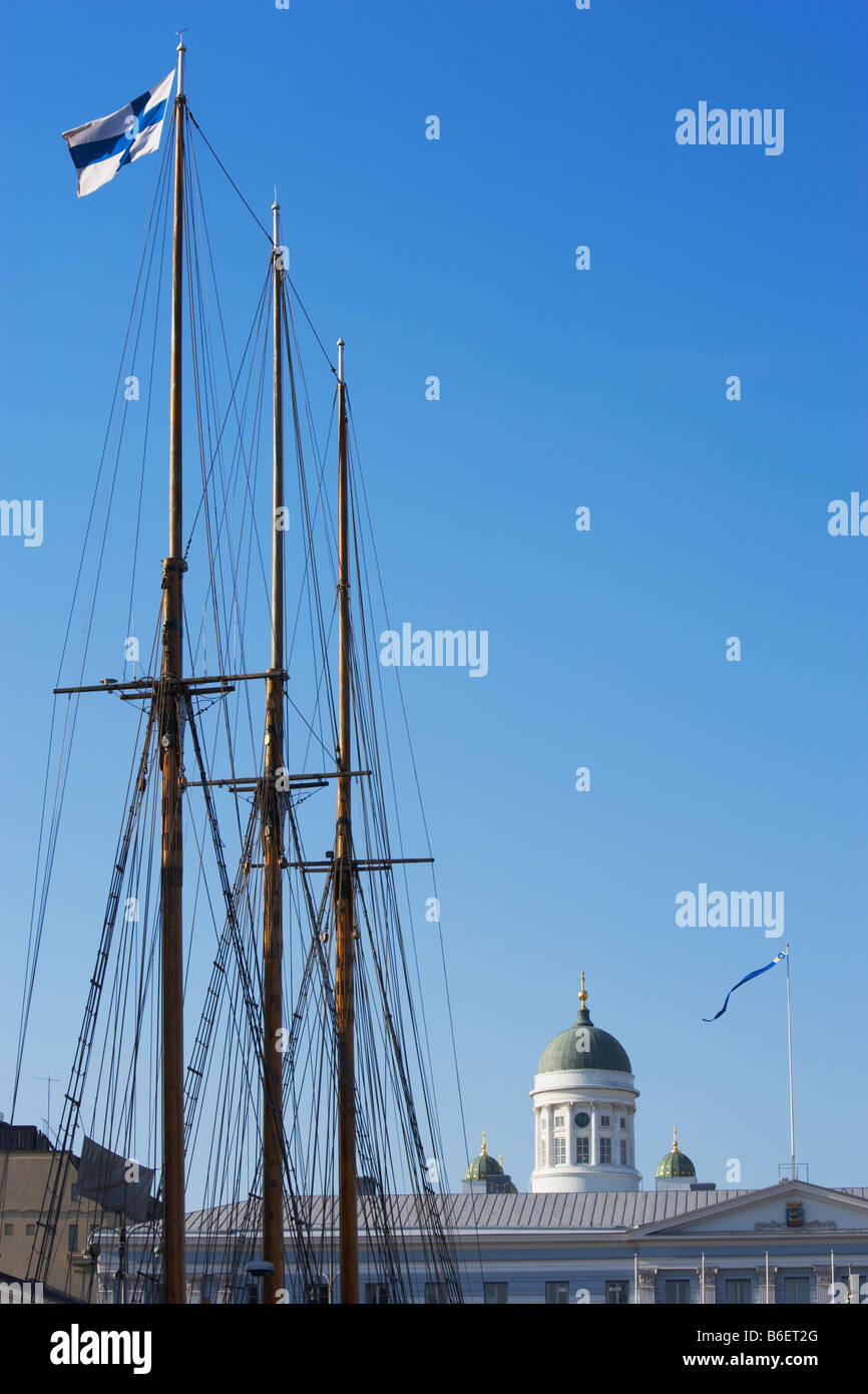 Finnish flag boat masts and dome of Helsinki Cathedral Helsinki Finland Stock Photo