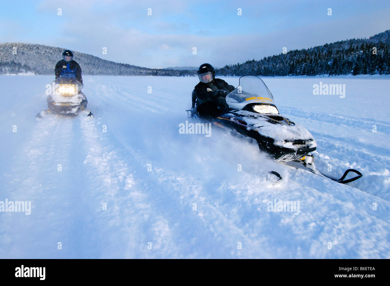 Snow mobile, snow mobiles in the snow, Saguenay Lac Saint Jean Region, Mont Valin, Quebec, Canada, North America Stock Photo