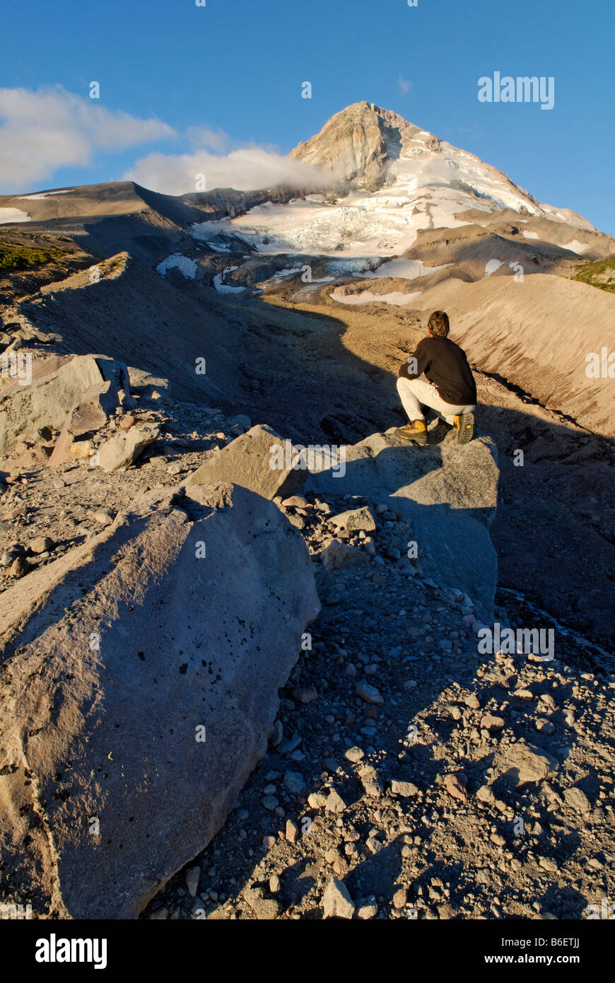 Mountain climber, Eastern edge of Mount Hood volcano and Elliot Glacier, Cooper Spur Trail, Cascade Range, Oregon, USA Stock Photo