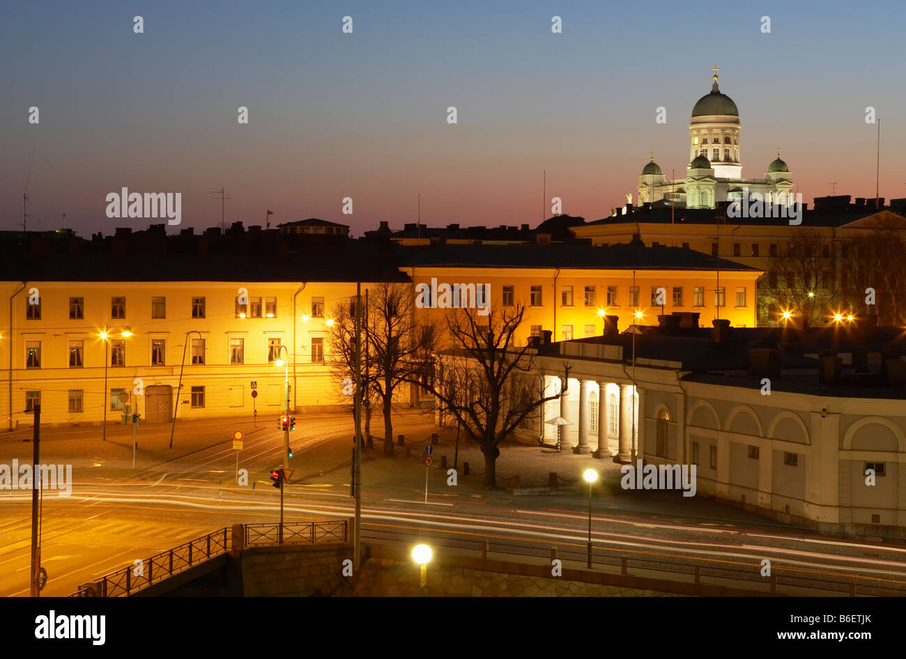 Helsinki skyline and Cathedral at dusk Presidential Palace and Guard Post illuminated in foreground Helsinki Finland Stock Photo