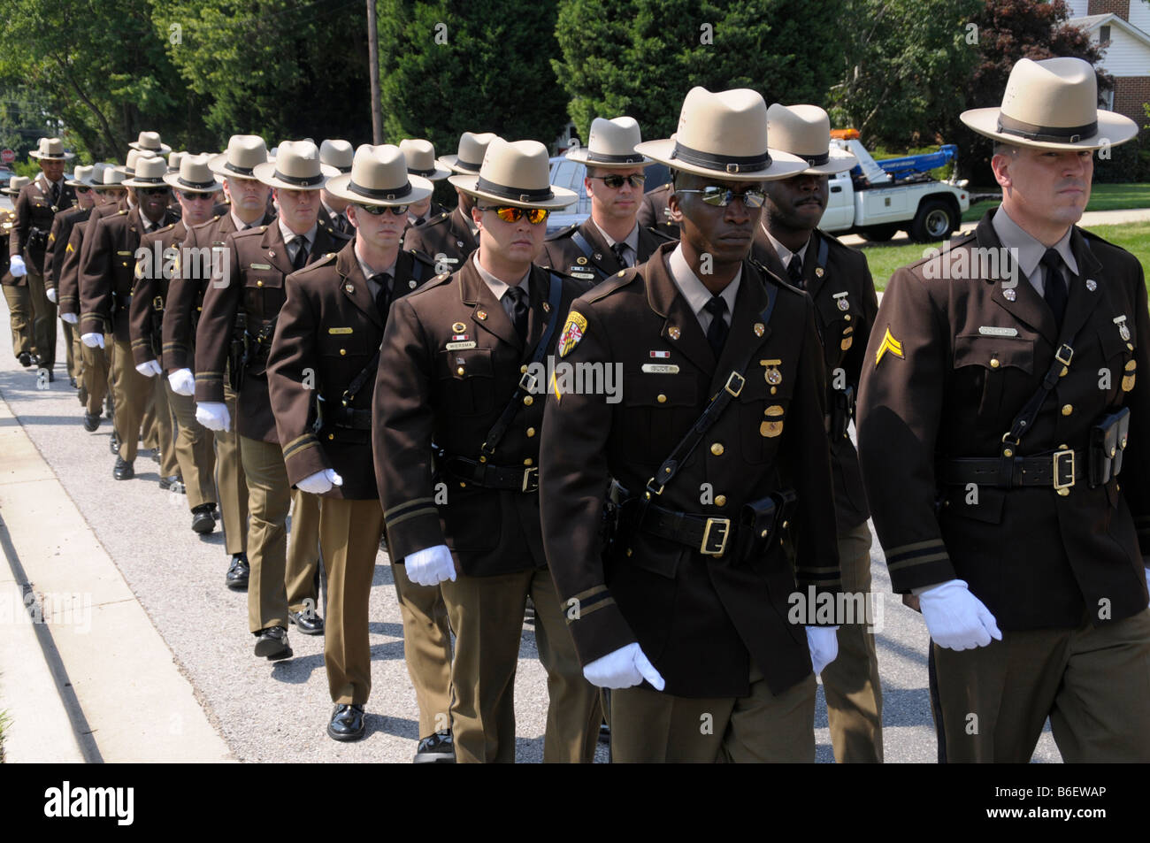 Maryland State police march to church in Beltsville, Md where funeral for a policeman who was killed by a suspect will be held Stock Photo
