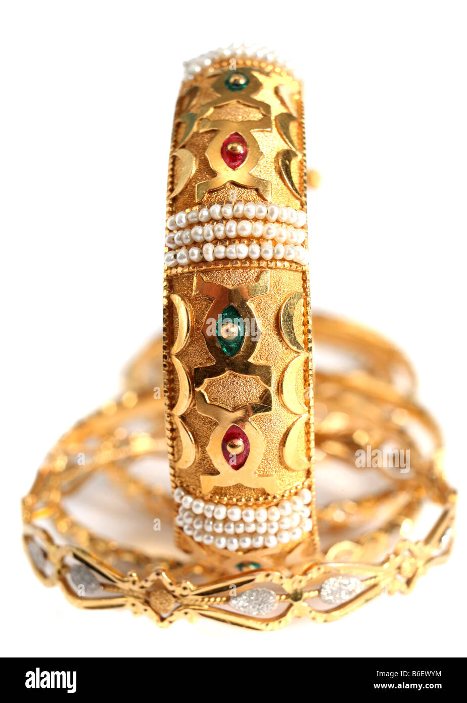 A gold bracelet with small natural Gulf pearls and inlaid with enamel in  the Arab style Stock Photo - Alamy