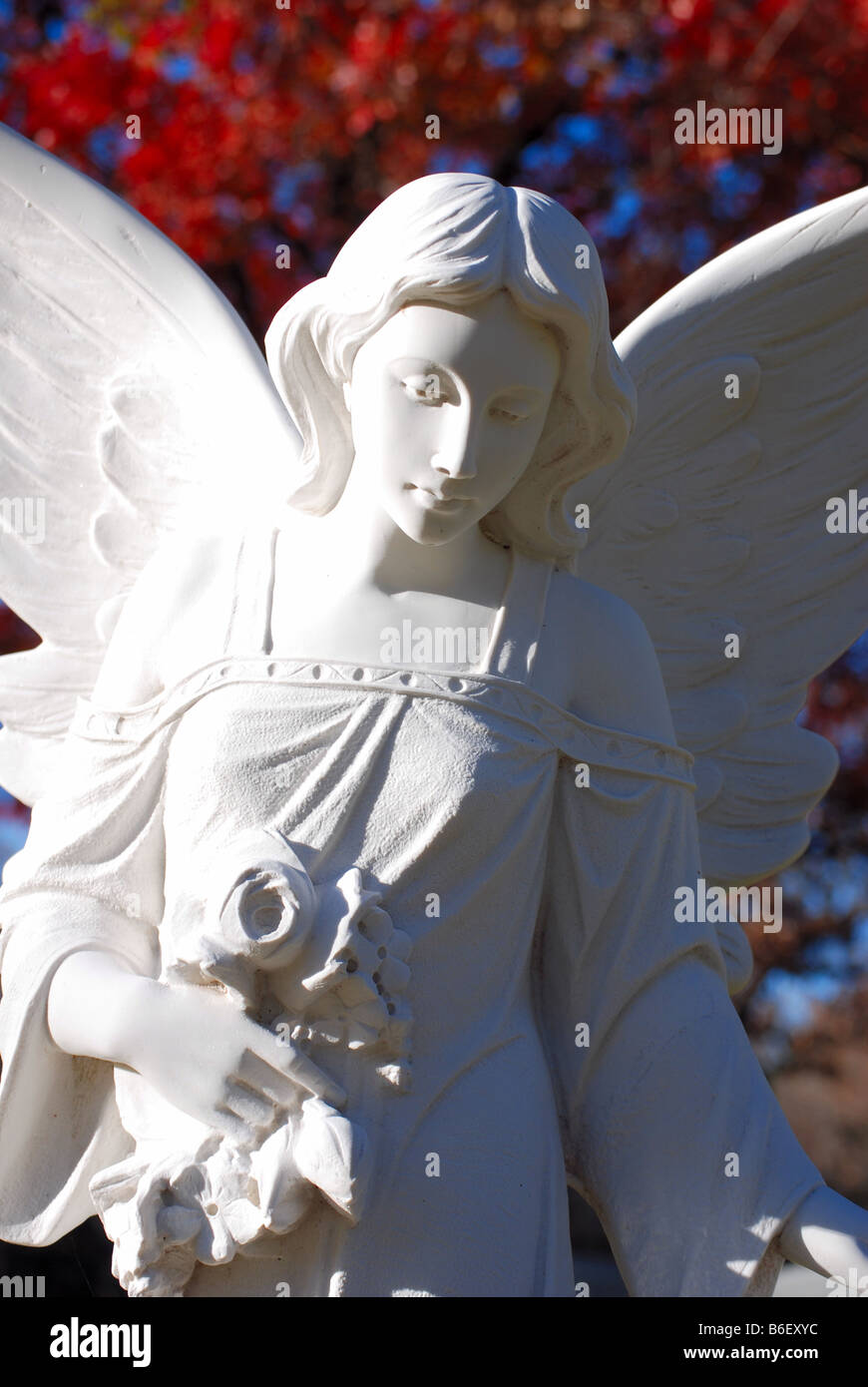 Vertical image of a white marble angel statue Stock Photo