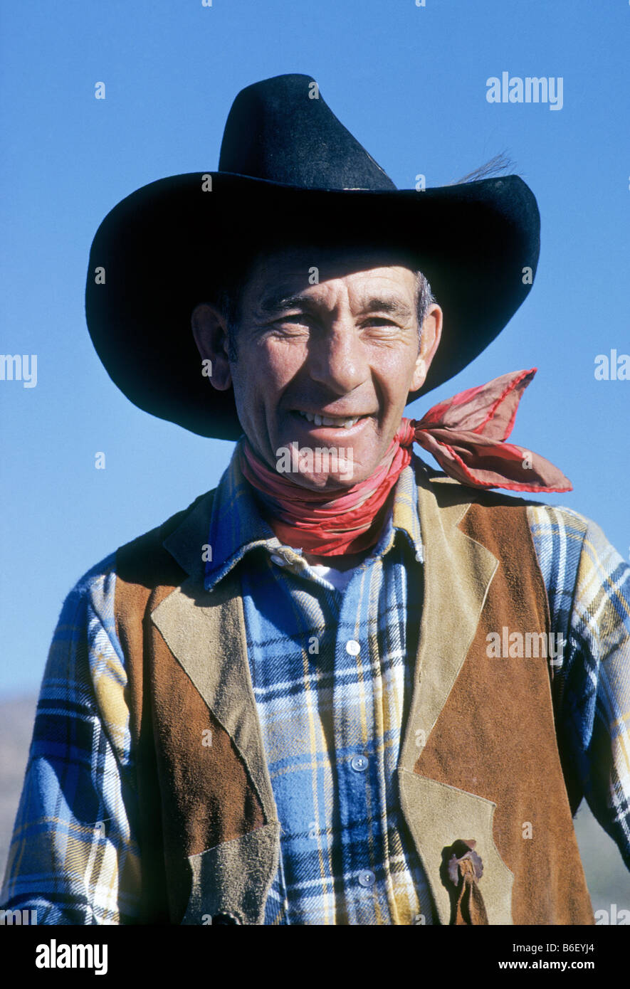 USA ARIZONA Portrait of a Tucson Arizona dude ranch wrangler complete with vest scarf and ten gallon hat Stock Photo