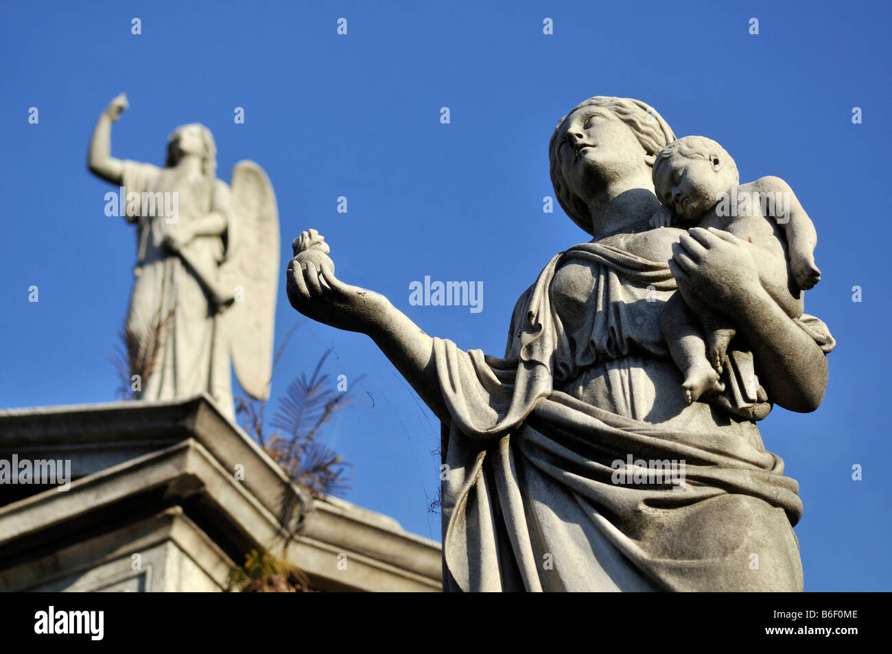 Virgin with child and Archangel Michael, tombs, at the La Recoleta cemetery, Buenos Aires, Argentina, South America Stock Photo
