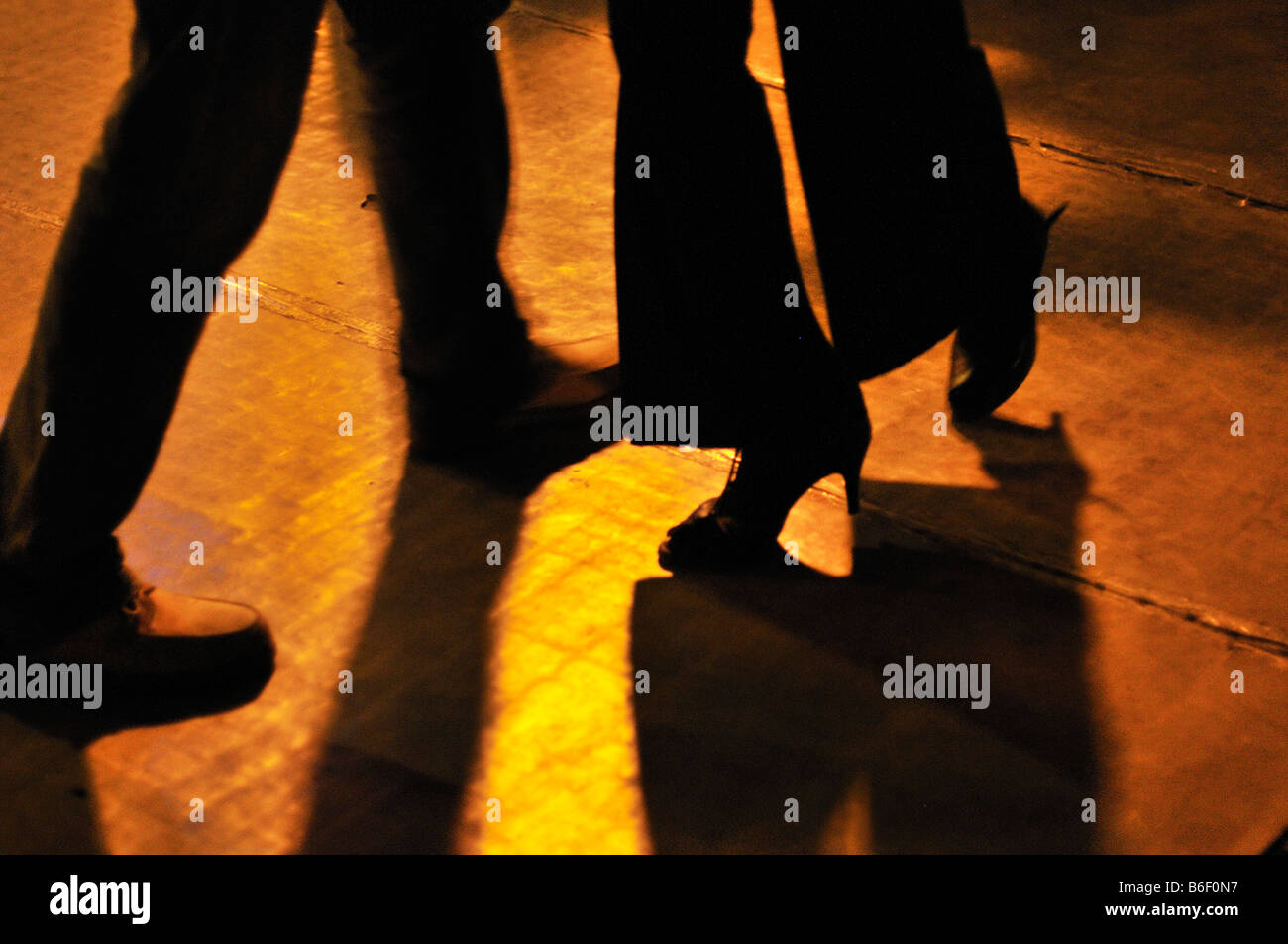 Legs of a dancing couple, tango event, Milonga, auf der Plaza Dorrego, Barrio San Telmo, Buenos Aires, Argentina, South America Stock Photo