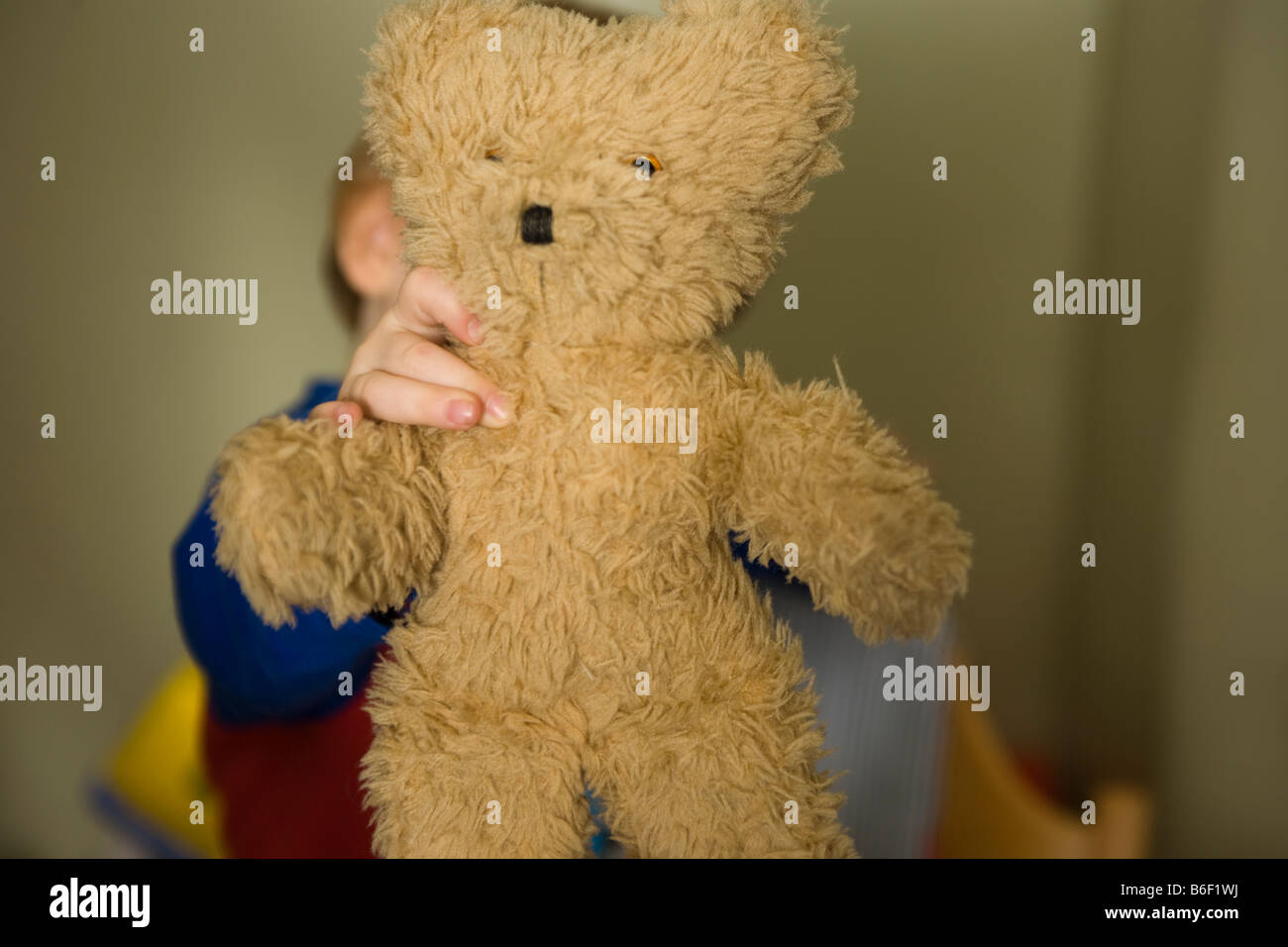 Child with teddy bear hi-res stock photography and images - Alamy