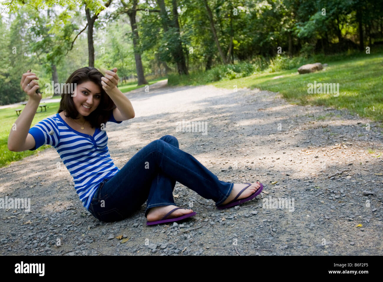 Woman flipflops jeans hi-res stock photography and images - Alamy