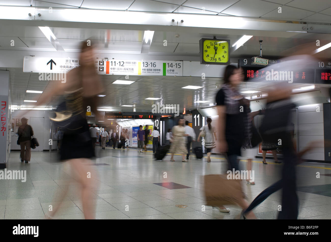 Japanese Commuters in Yokohama Station Stock Photo