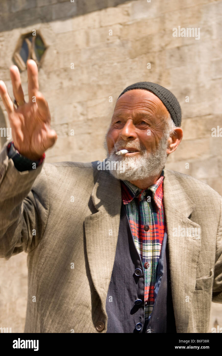 Elderly Turkish man smoking cigarette in Erzurum in Eastern Turkey ...