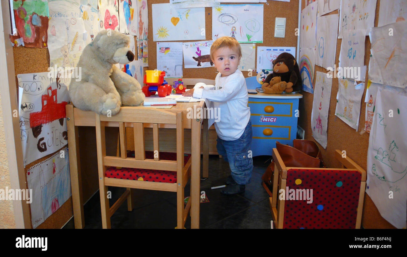 Boy standing in corner hires stock photography and images Alamy
