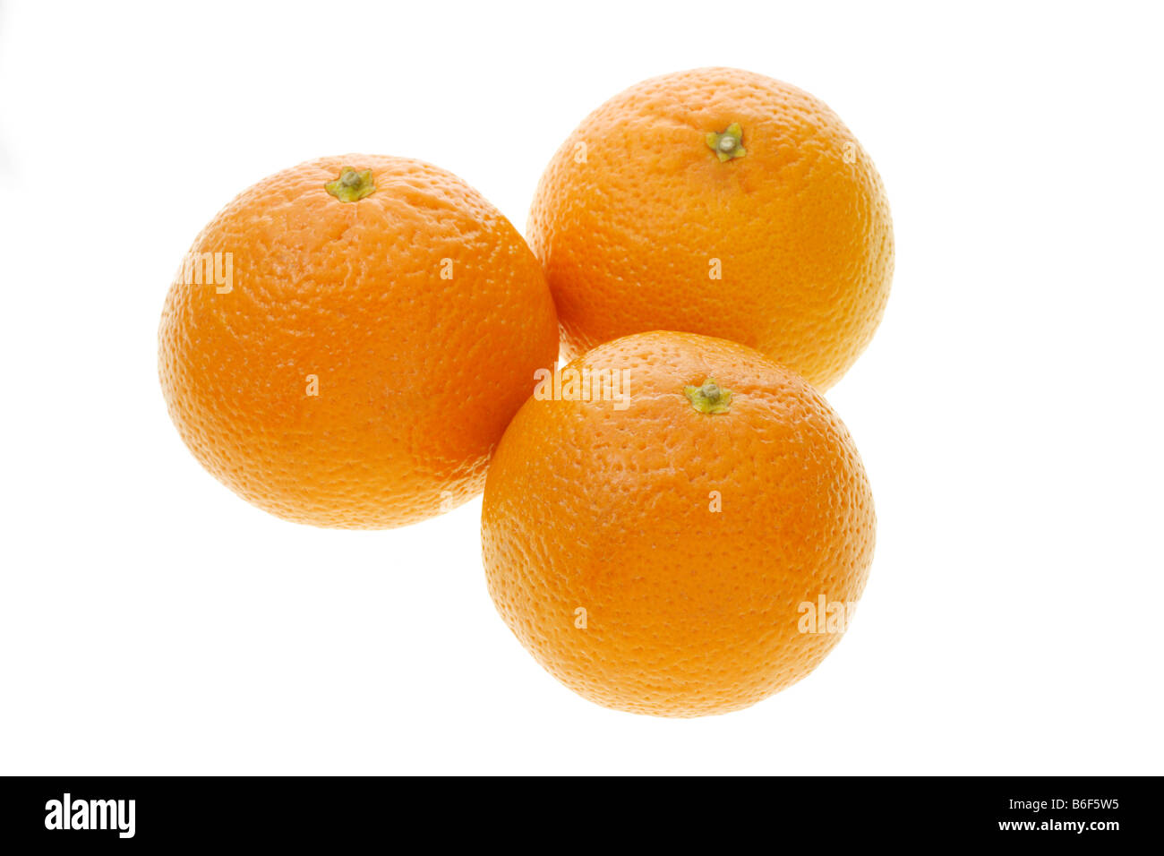 Three Chinese mandarin oranges on white background Stock Photo Alamy