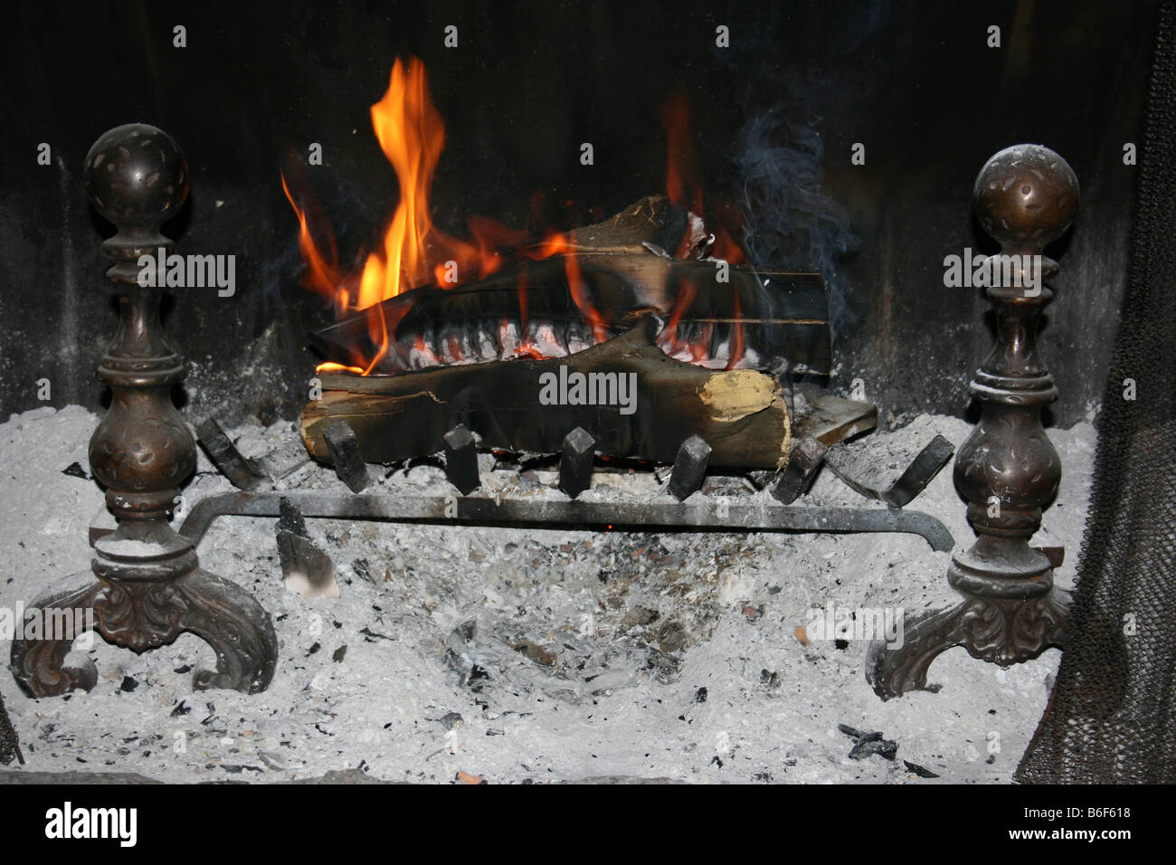 Tranquility Romance or Warmth a nice fire in the fireplace means many things to many people Stock Photo