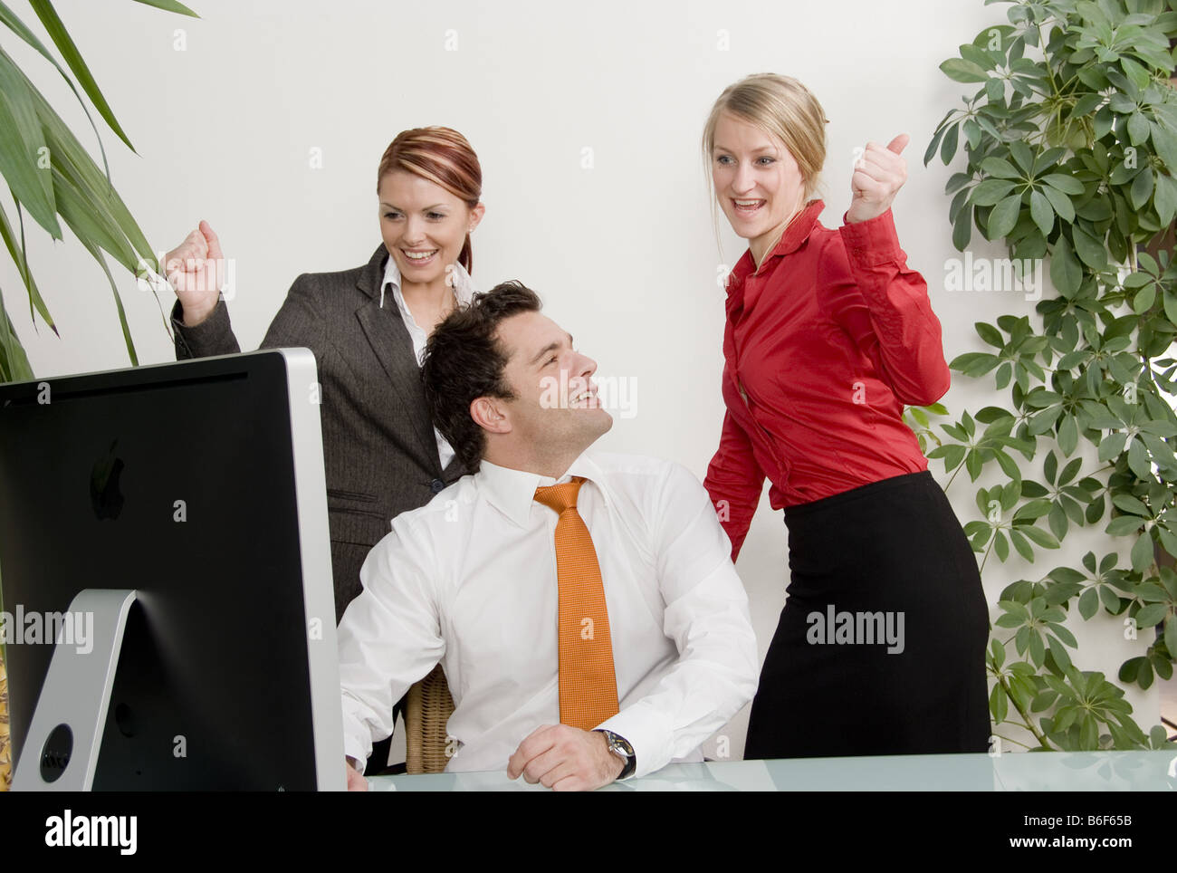three young and successful business people Stock Photo - Alamy