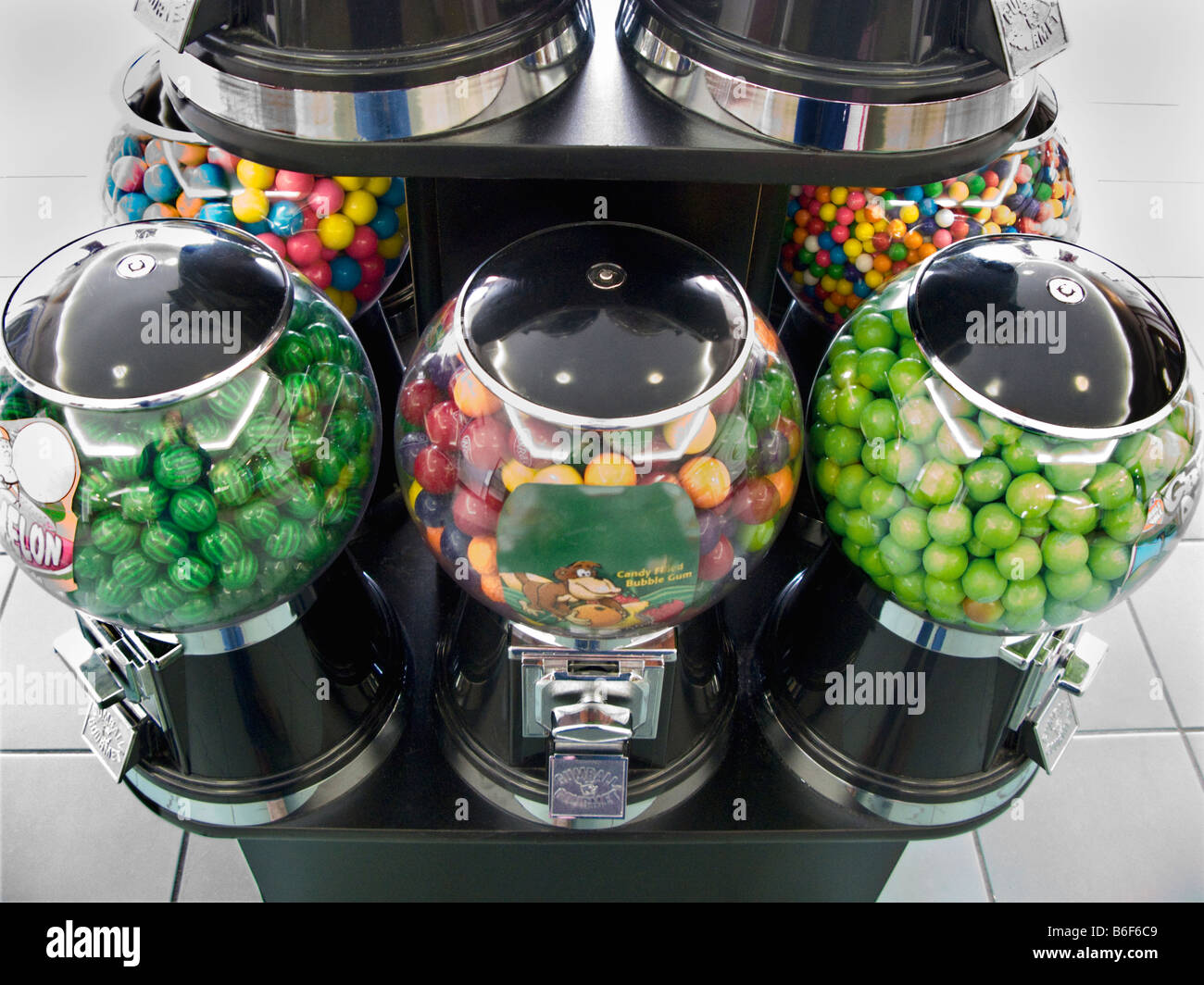 Several coin operated gumball machines Stock Photo