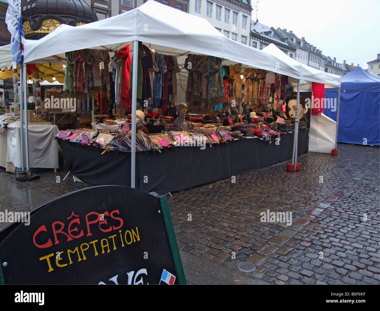 A market stall selling clothes on Strøget in Copenhagen, Denmark. Strøget is the longest pedestrian street in Europe Stock Photo