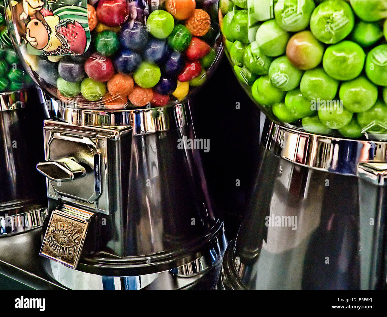line of coin operated gumball machines Stock Photo