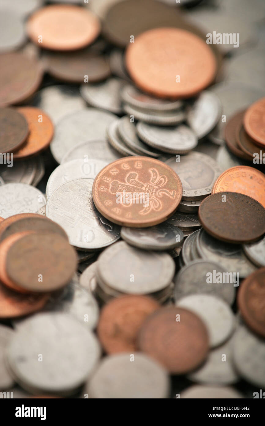 A large pile of various British, sterling coins Stock Photo