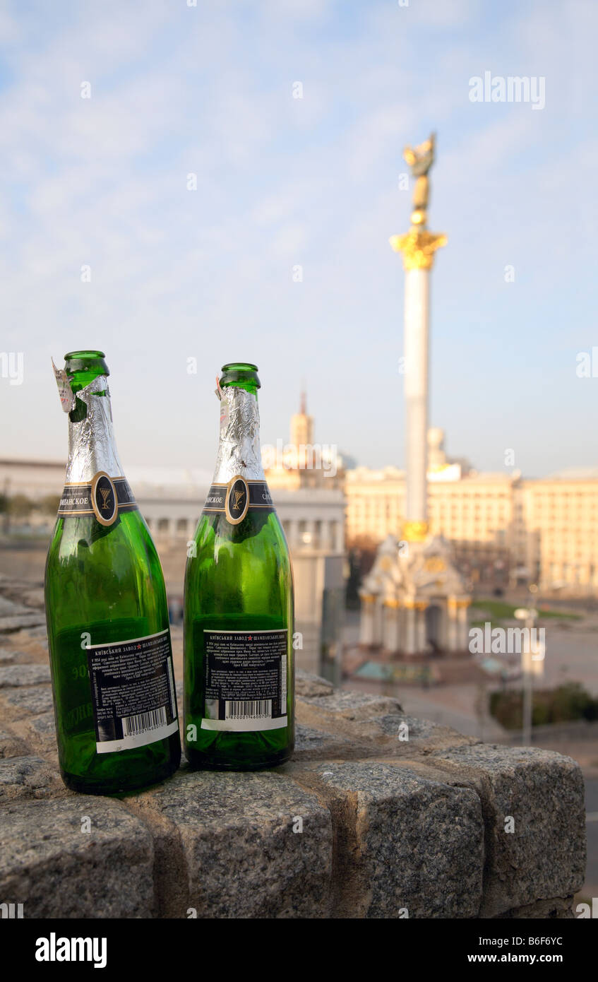 Morning 'Maidan Nezalezhnosti ('Independence Square') scene with two empty bottles from (Kiev-City centre, Ukraine). Stock Photo