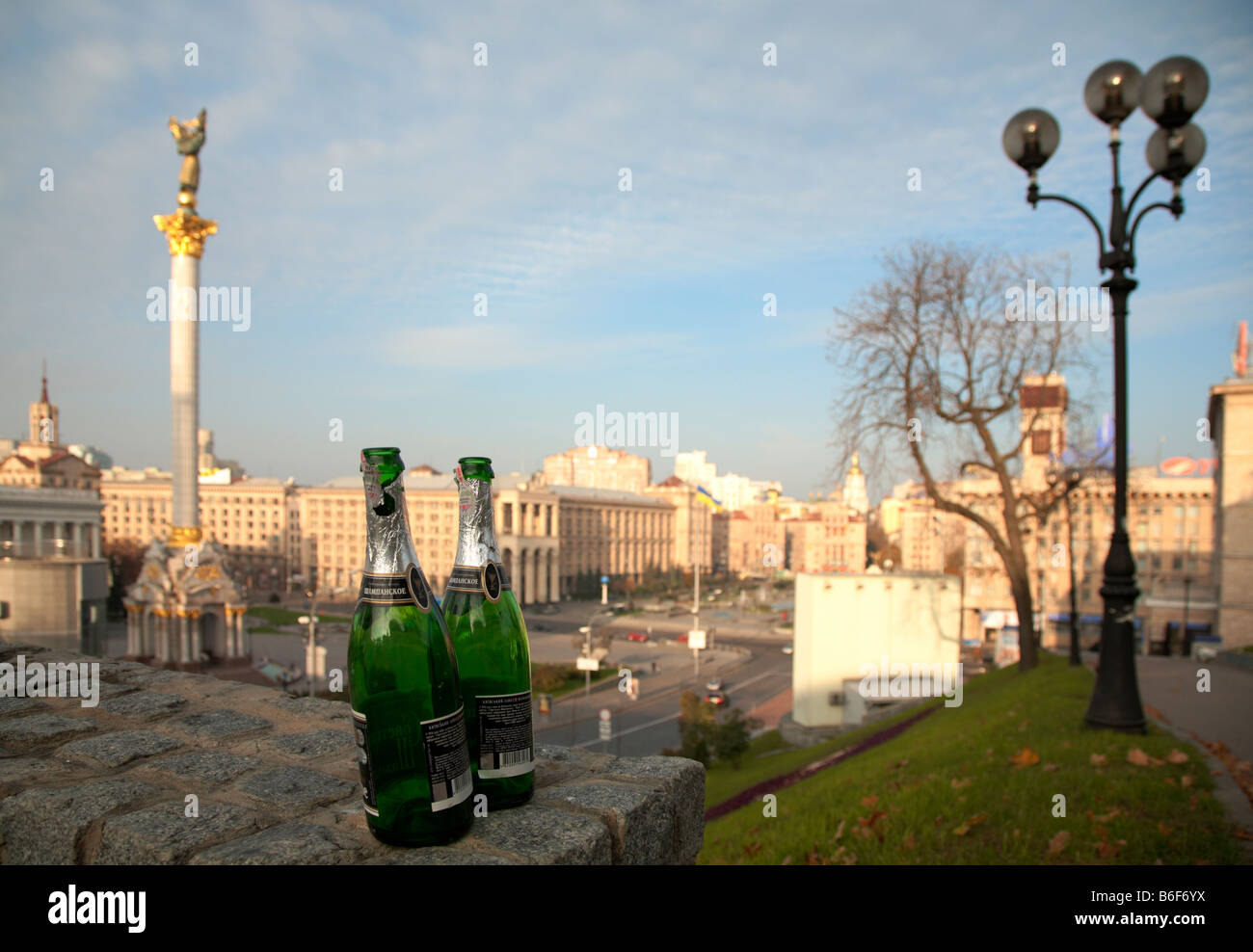 Morning 'Maidan Nezalezhnosti ('Independence Square') scene with two empty bottles from (Kiev-City centre, Ukraine). Stock Photo
