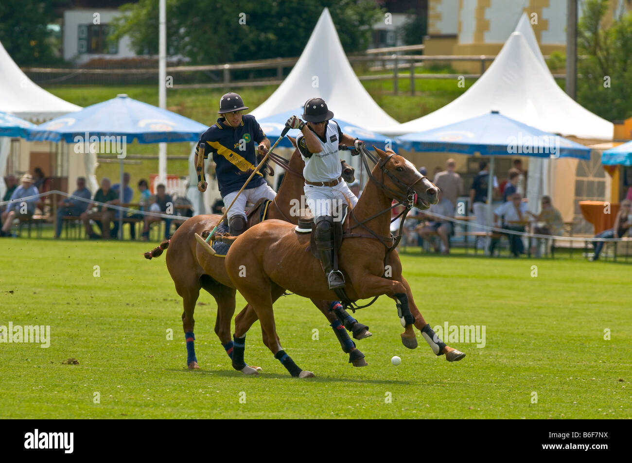 Two polo players jostling for the ball at the Berenberg High Goal Trophy 2008 polo tournament in Thann, Holzkirchen, Bavaria, G Stock Photo